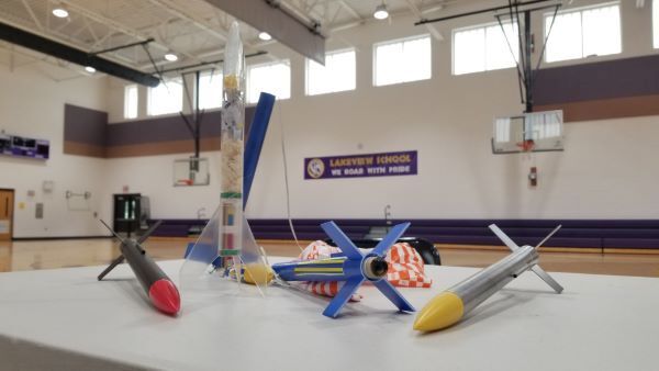 Table full of model rockets.