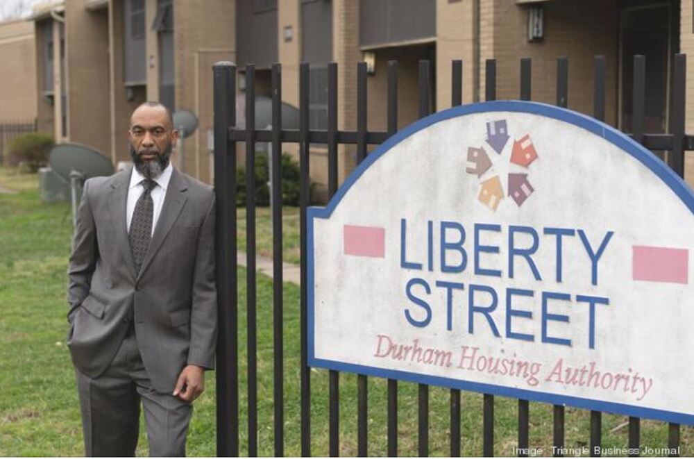Anthony Scott stands next to the Liberty Street property. 