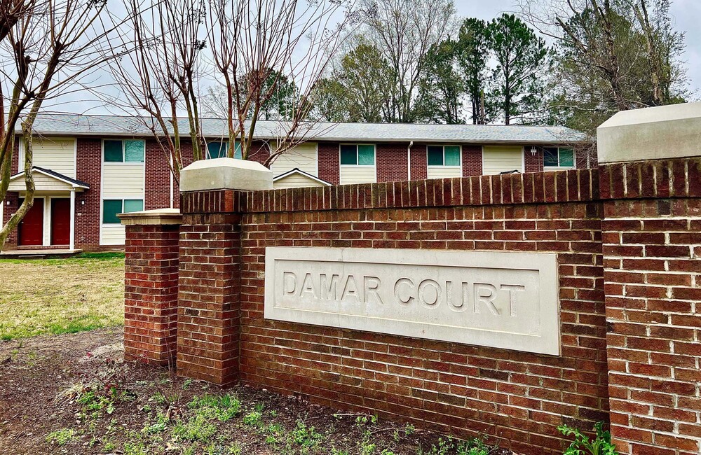 Damar Court sign sits out side of the Damar Court apartments Court 