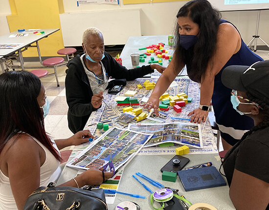 Individuals helping with redevelopment planning for McDougald Terrace.