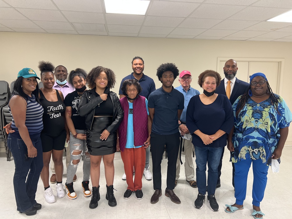 A group of individuals standing together at the 2022 READS Scholarship Award event.