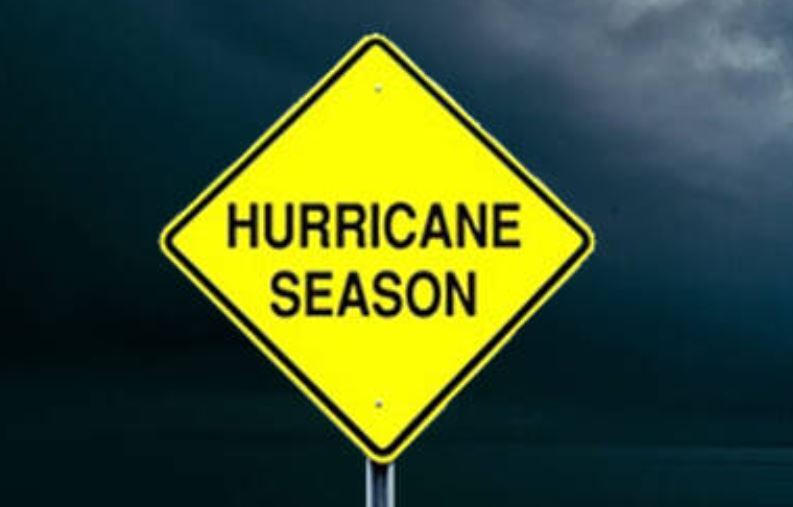 stormy sky with hurricane season sign