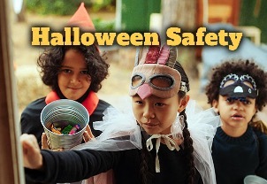 Halloween Safety. Three kids in costumes, trick or treating. 