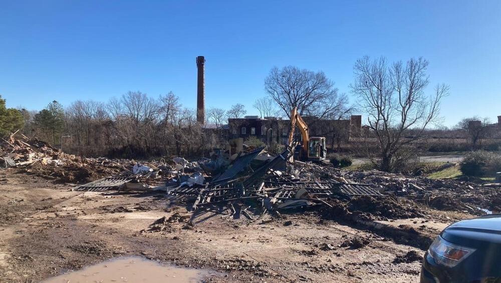 A landscape with demolition equipment.