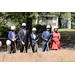 group standing next to broken ground smiling
