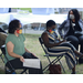 three masked ladies in crowd 