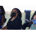 lady with curly hair listening to speech