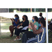 Four ladies clapping.