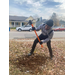 Man digging up the ground