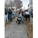 A group of people standing outside