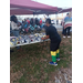 A boy looking at bike helmets