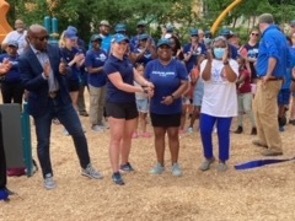 A group of individuals standing at a park