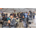 People gathered under the event tent