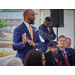 Durham Housing Authority's Executive Director speaking in front of a podium.