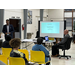 A man doing a presentation in front of the audience.